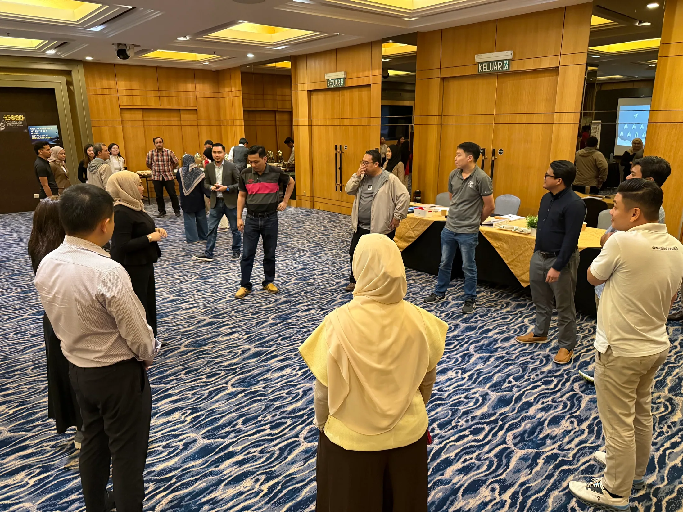 MDP participants taking part in a circle group exercise